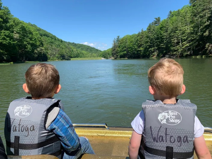 Anna Rollins' children riding a boat