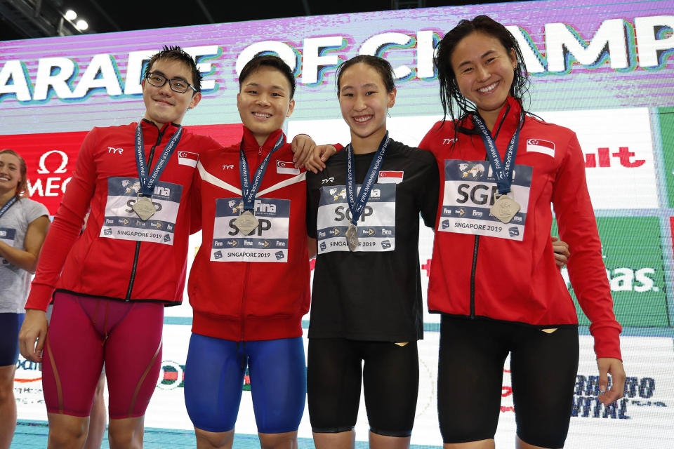 The silver-winning Singapore mixed 4x100m freestyle team at the Fina Swimming World Cup: (from left) Darren Chua, Pang Sheng Jun, Cherlyn Yeoh and Quah Ting Wen. (PHOTO: Singapore Swimming Association/Simone Castrovillari)