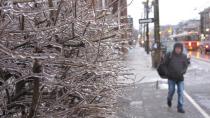 During an ice storm, pedestrians are advised to watch for branches or wires that could break or fall due to the weight of the ice.