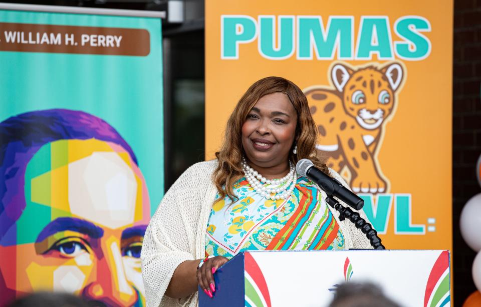 Perry Elementary school principal Keisha Fulson spoke during a ribbon cutting ceremony at the new Perry Elementary School located at 18th and Broadway in Louisville's West End on Friday, Aug. 4, 2023