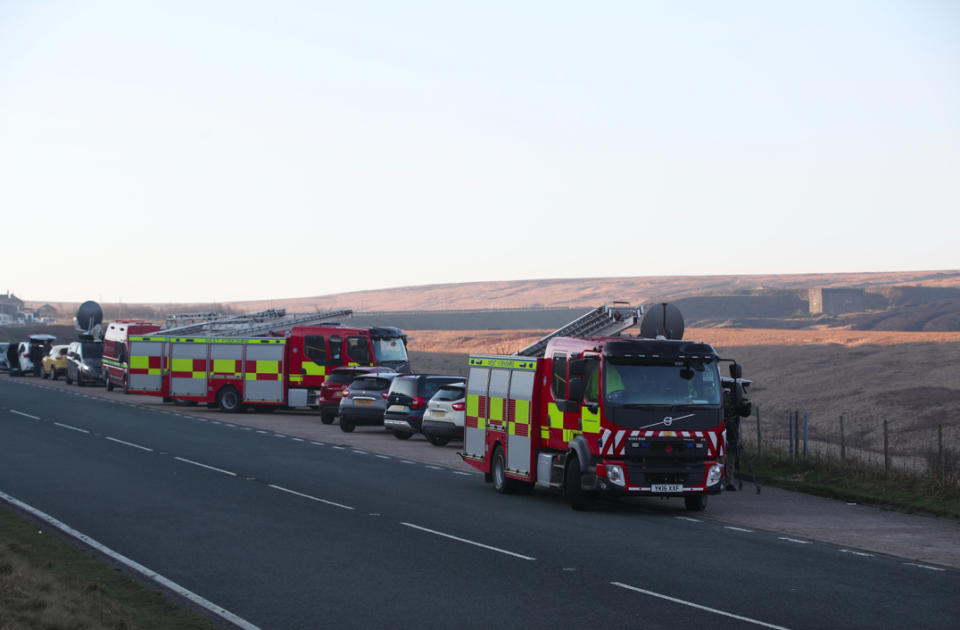 <em>Crews from West Yorkshire Fire and Rescue Service battled to contain it through the night (PA)</em>