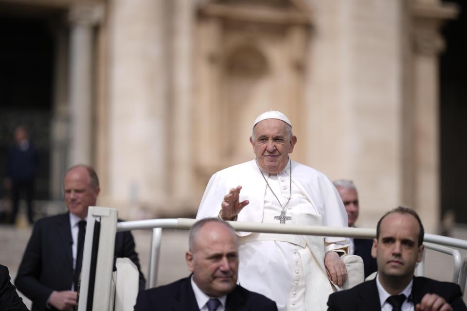 Pope Francis waves as he leaves after his weekly general audience in St. Peter's Square at The Vatican, Wednesday, April 10, 2024. (AP Photo/Andrew Medichini)