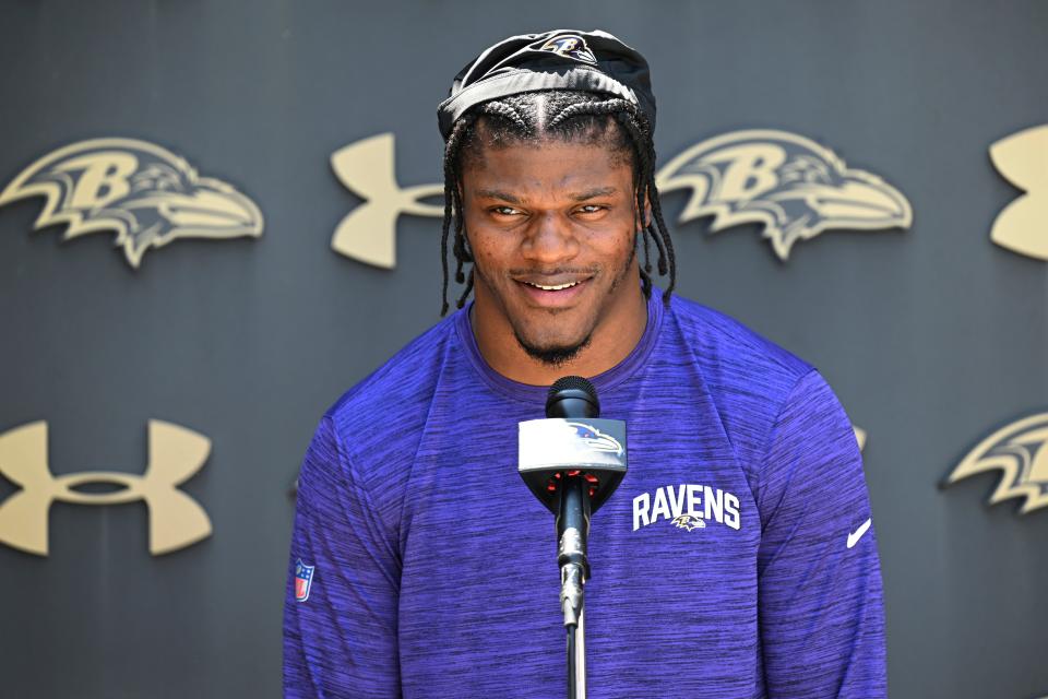 Baltimore Ravens quarterback Lamar Jackson answers questions from the media before NFL football practice Wednesday, June 14, 2023, in Owings Mills, Md.