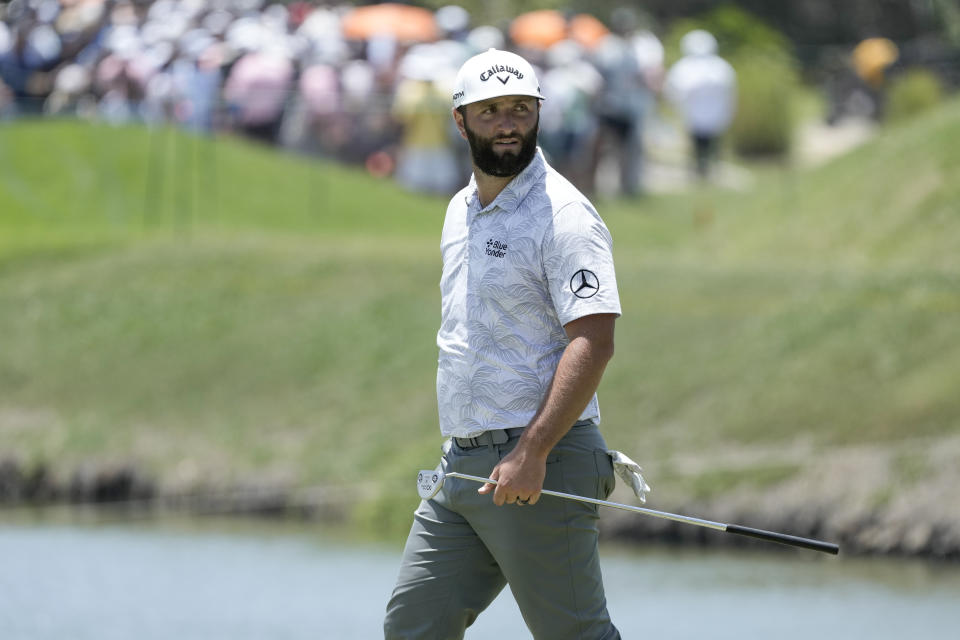 Jon Rahm, of Spain, walks on the 11th green during the Mexico Open golf tournament's third round in Puerto Vallarta, Mexico, Saturday, April 29, 2023. (AP Photo/Moises Castillo)