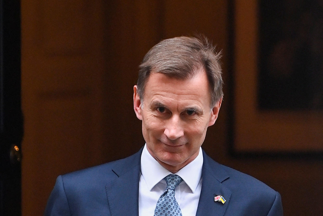 UK government surplus Britain's Chancellor of the Exchequer Jeremy Hunt walks at Downing Street in London, Britain, November 17, 2022. REUTERS/Toby Melville