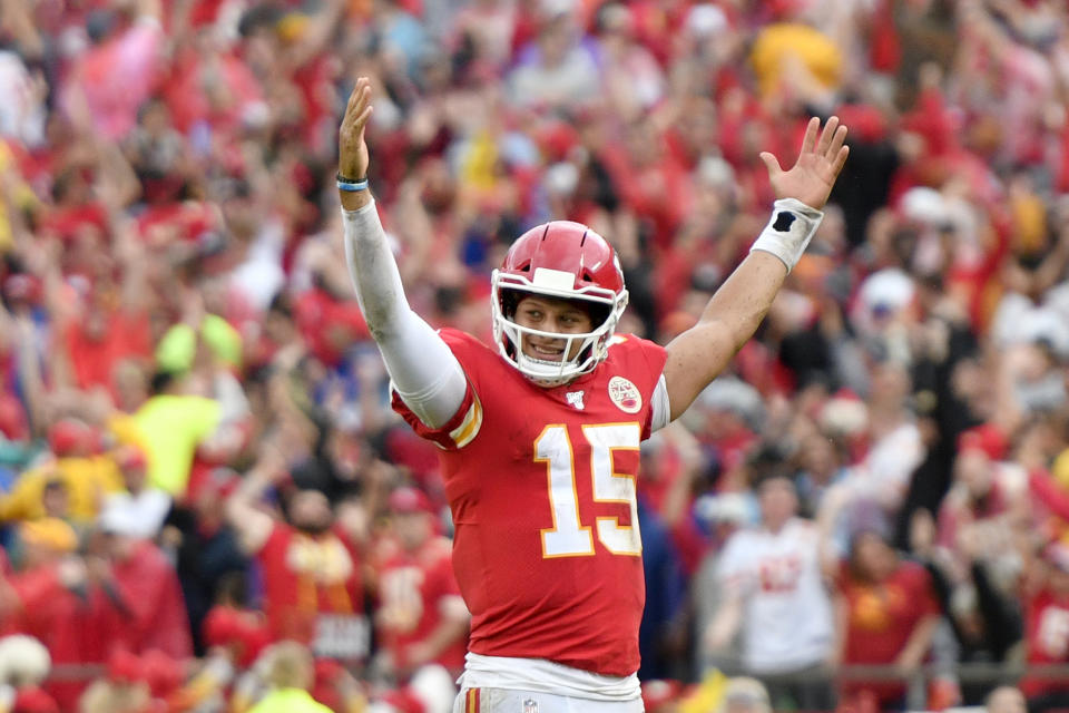 Kansas City Chiefs quarterback Patrick Mahomes (15) celebrates a touchdown by running back Darwin Thompson during the second half of an NFL football game against the Baltimore Ravens in Kansas City, Mo., Sunday, Sept. 22, 2019. (AP Photo/Ed Zurga)