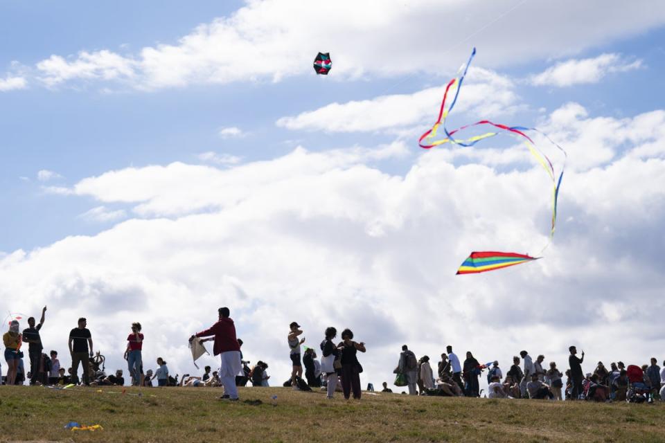 People fly their kites at the event to mark a year since the Taliban takeover of Afghanistan (Kirsty O’Connor/PA) (PA Wire)