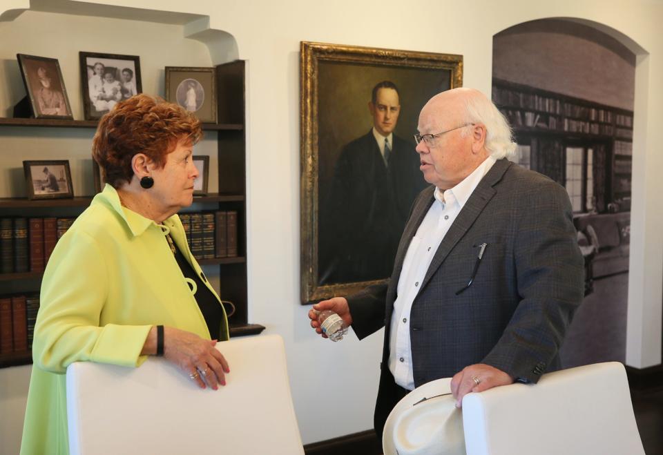 Summit County Executive Ilene Shapiro talks with Akron historian Dave Lieberth at the Summit County Land Bank's new offices at the former home of John S. Knight in Akron on Friday.