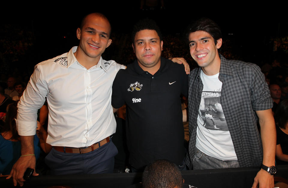 Junior dos Santos, Ronaldo & Kaka in attendance during UFC 148 inside MGM Grand Garden Arena on July 7, 2012 in Las Vegas, Nevada. (Photo by Jeff Bottari/Zuffa LLC via Getty Images)