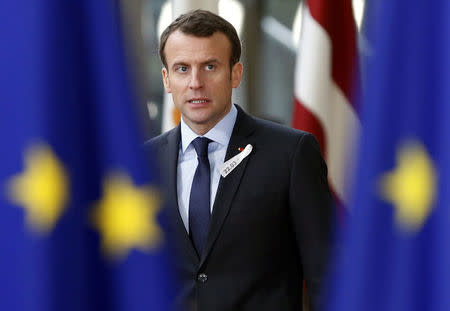 FILE PHOTO: France's President Emmanuel Macron arrives at a European Union leaders summit in Brussels, Belgium, March 22, 2018. REUTERS/Francois Lenoir/File Photo