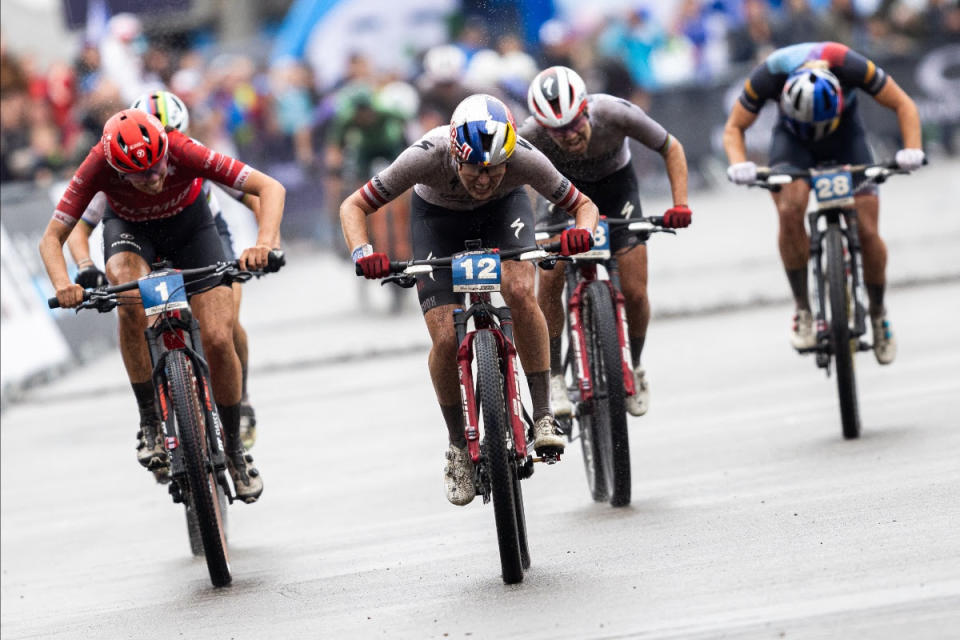 Laura Stigger (Specialized Factory Racing) carries bib 12 across the line in first place at Nove Mesto XCC World Cup opener 2023