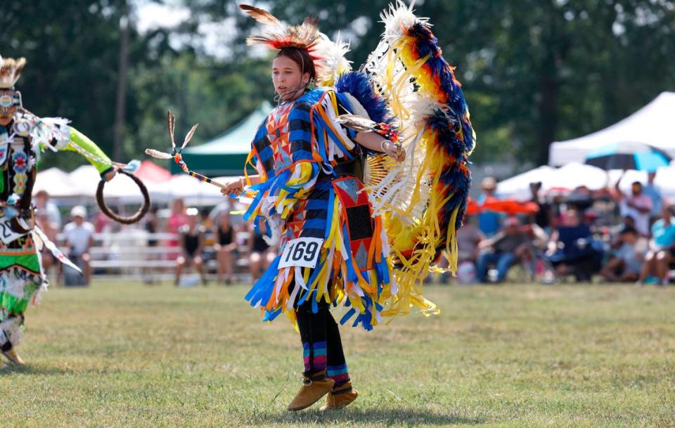 Bella Goins of Fayetteville, a member of the Lumbee Tribe, participates in a switch dance during the Dix Park Inter-Tribal Pow Wow in Raleigh, N.C., Saturday, August 26, 2023. Ethan Hyman/ehyman@newsobserver.com