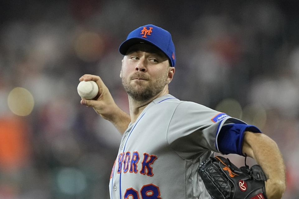 New York Mets starting pitcher Tylor Megill throws during the first inning of a baseball game against the Houston Astros Wednesday, June 21, 2023, in Houston. (AP Photo/David J. Phillip)