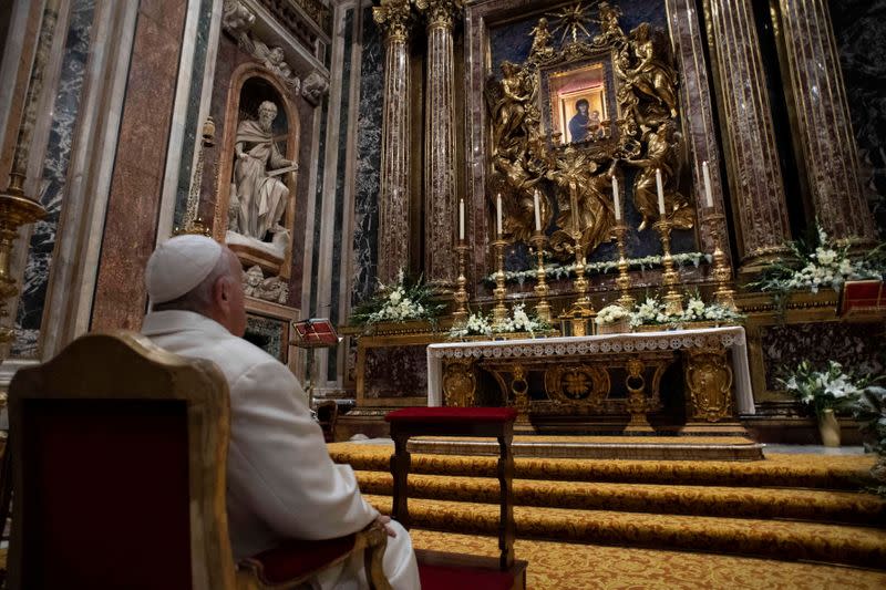 Pope Francis prays in front of the icon of Mary "Salus Populi Romani" (Salvation of the Roman People) at the Basilica of Santa Maria Maggiore, on the feast of the Immaculate Conception, in Rome