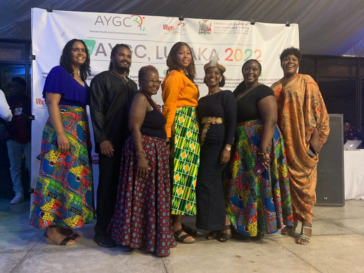 Arielle Noseworthy-David, far left, and Barbara Hamilton-Hinch, third from left, were among delegates at the 14th African Youth and Governance Convergence event last summer in Zambia. (AYGC Media Team - image credit)