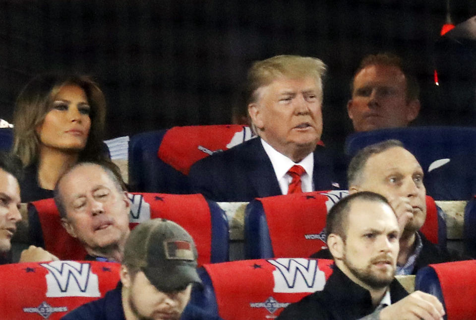 Melania and Donald Trump attend Game Five of the 2019 World Series between the Houston Astros and the Washington Nationals at Nationals Park. (Photo by Rob Carr/Getty Images)