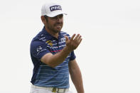 Louis Oosthuizen, of South Africa, reacts after missing his birdie putt on the 14th green during the final round of the U.S. Open Golf Championship, Sunday, June 20, 2021, at Torrey Pines Golf Course in San Diego. (AP Photo/Jae C. Hong)