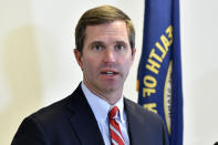 Kentucky Governor-Elect Andy Beshear speaks with reporters following the concession of incumbent Governor Matt Bevin in Frankfort, Ky., Thursday, Nov. 14, 2019. In a recanvass Beshear defeated Bevin by 5136 votes. (AP Photo/Timothy D. Easley)