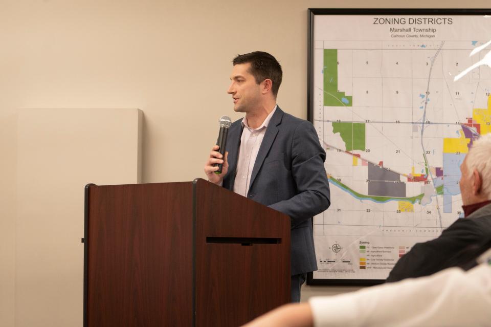 Josh Hundt, executive vice president and chief projects officer with the Michigan Economic Development Corporation, gives remarks in support of site development during a special meeting regarding the Marshall mega site in Marshall Township on Thursday, Jan. 26, 2023.