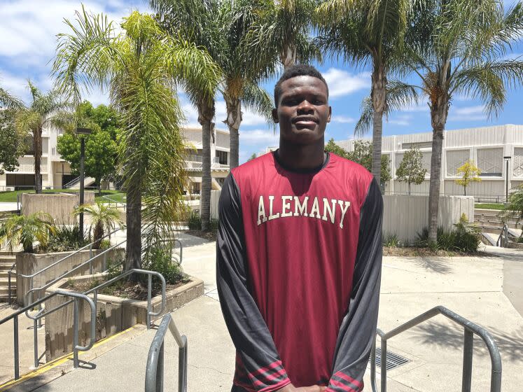 A native of the Democratic Republic of the Congo, Alemany's 6-foot-10 sophomore Samuel Mbingazo poses for a photo.