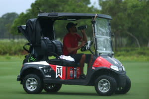 Tiger Woods rides in his cart during The Match: Champions For Charity at Medalist Golf Club on May 24, 2020 in Hobe Sound, Florida