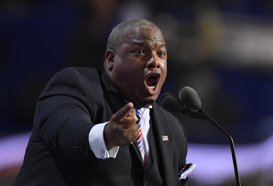 FILE - In this July 21, 2016 file photo, Pastor Mark Burns speaks during the final day of the Republican National Convention in Cleveland. Burns, a backer since the early days of President Donald Trump’s 2016 campaign, said in an interview that “it’s important that religious leaders reach out to the president.” Burns contended that Trump’s struggles are partly connected to his Christian faith, adding that “Satan wants to remove a vessel that God has installed to again be a blessing to the religious community.” (AP Photo/Mark J. Terrill, File)