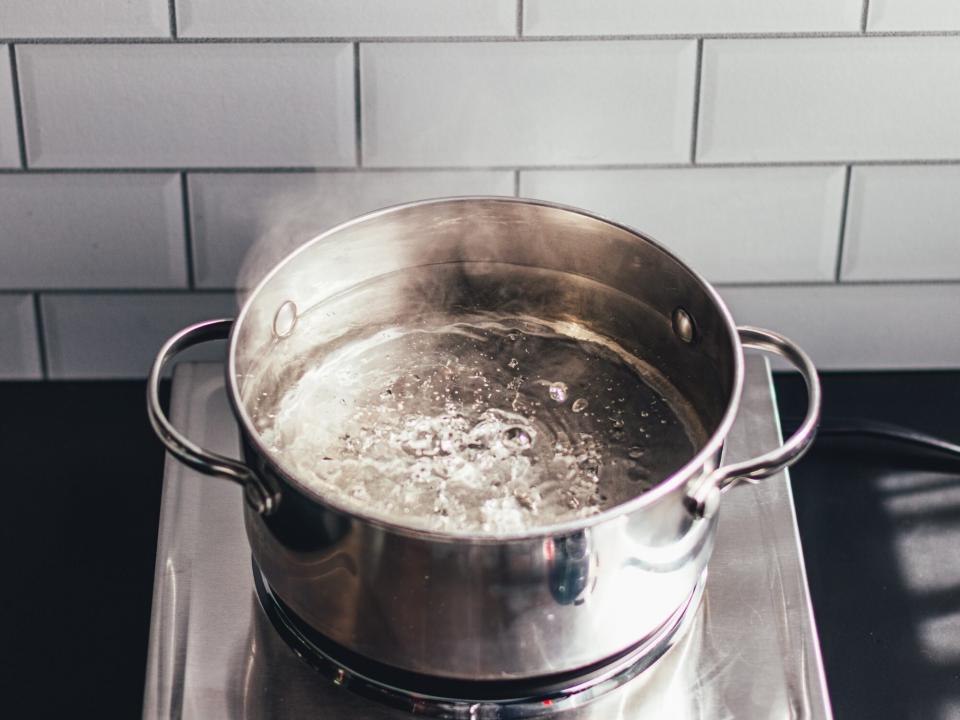 a stainless steel pot of boiling water