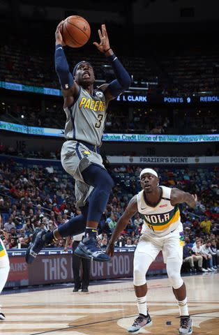 Layne Murdoch Jr./NBAE/Getty Aaron Holiday #3 of the Indiana Pacers shoots the ball against Jrue Holiday #11 of the New Orleans Pelicans on February 4, 2019 at the Smoothie King Center in New Orleans, Louisiana.