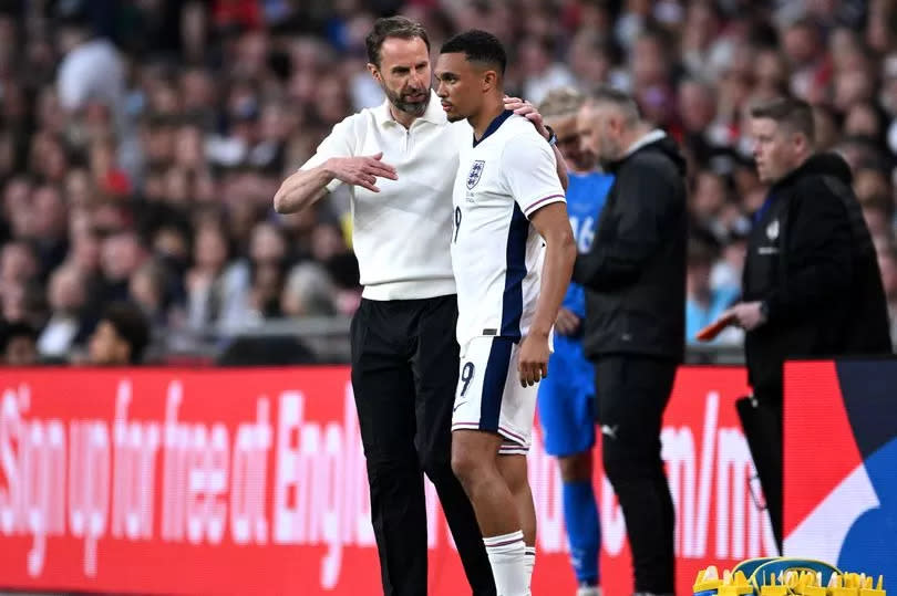 England manager Gareth Southgate (L) with Trent Alexander-Arnold (R)