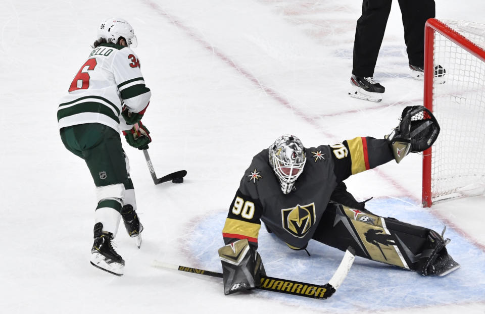 LAS VEGAS, NEVADA - APRIL 01: Robin Lehner #90 of the Vegas Golden Knights saves a shot by Mats Zuccarello #36 of the Minnesota Wild in a shootout at T-Mobile Arena on April 01, 2021 in Las Vegas, Nevada. (Photo by Jeff Bottari/NHLI via Getty Images)