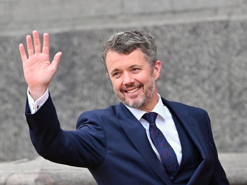 Crown Prince Frederik waves to crowds in November 2022