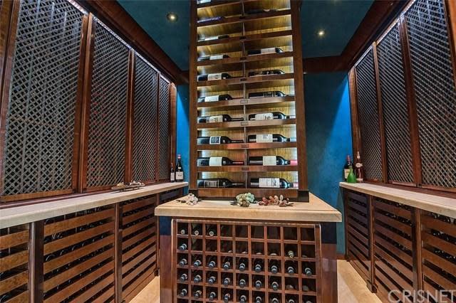 <p>The home also boasts a temperature-controlled wine cellar with room for 3,000 bottles. (Trulia) </p>