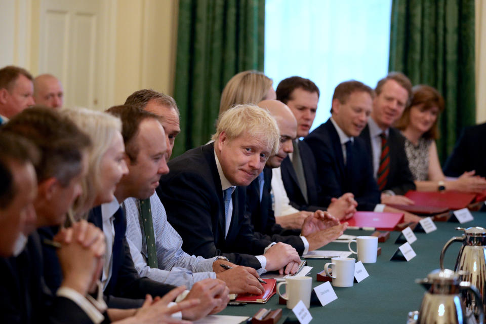 Prime Minister Boris Johnson holds his first Cabinet meeting at Downing Street in London.