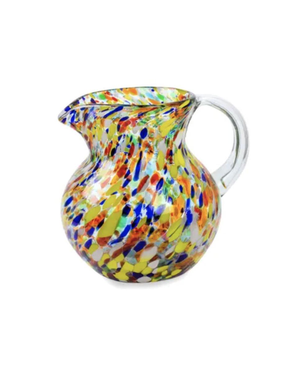 <p><strong>UNICEF Market</strong></p><p>unicefusa.org</p><p><strong>$49.95</strong></p><p><a href="https://www.market.unicefusa.org/p/hand-blown-glass-pitcher-71-oz-multicolor/U13245/" rel="nofollow noopener" target="_blank" data-ylk="slk:Shop Now;elm:context_link;itc:0;sec:content-canvas" class="link ">Shop Now</a></p><p>Crafted by hand, this blown glass reveals a bright confetti pattern that'll brighten up any kitchen. Each purchase of this pitcher can provide 27 doses of measles vaccines to protect children.</p>