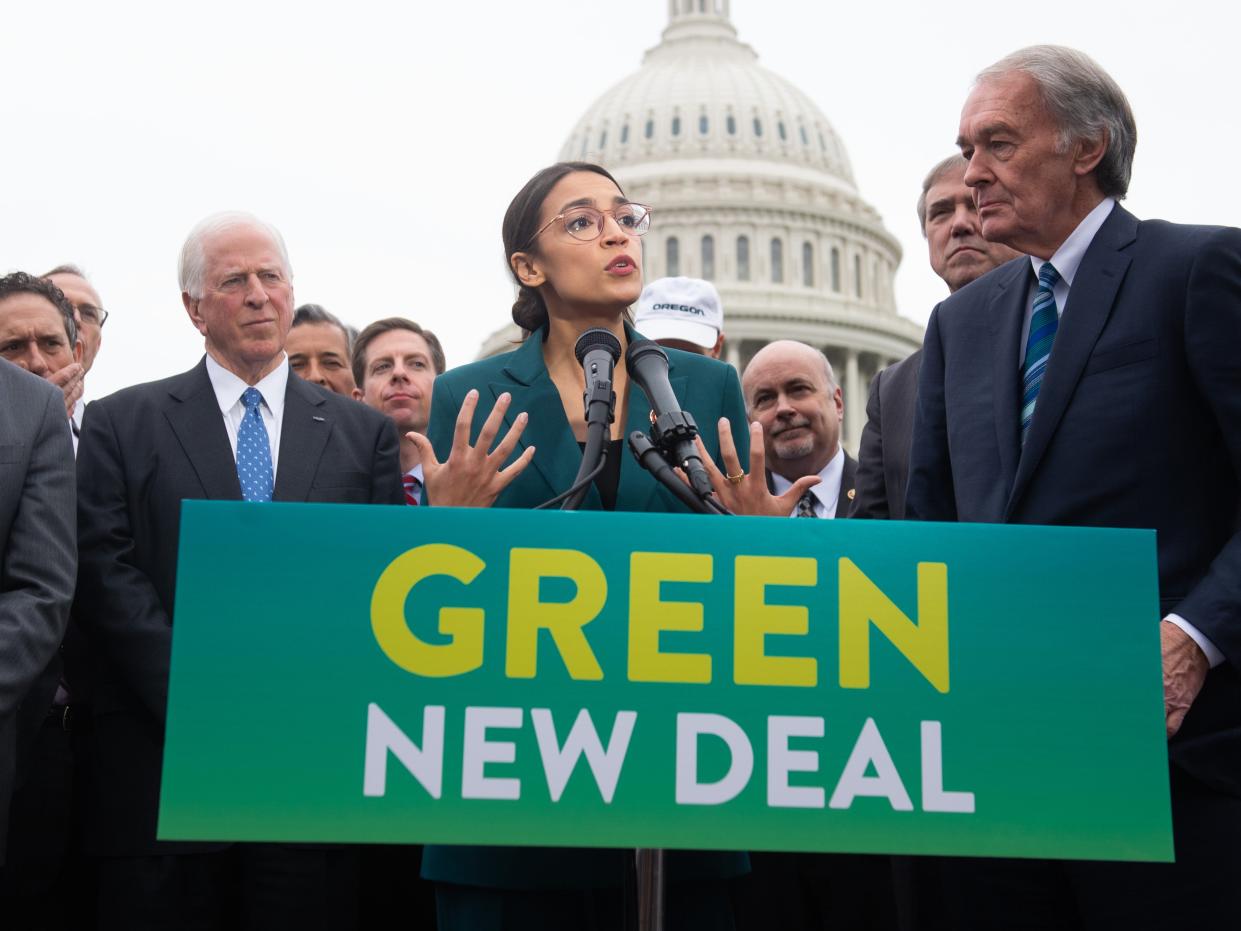 Alexandria Ocasio-Cortez and Ed Markey introduce the Green New Deal resolution on 7 February 2019 (AFP via Getty Images)