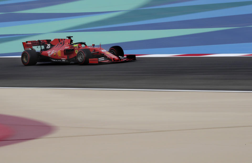 Mick Schumacher steers a Ferrari car during his first F1 test for Ferrari at the Bahrain International Circuit in Sakhir, Bahrain, Tuesday, April 2, 2019. Mick Schumacher has moved closer to emulating his father Michael by driving a Ferrari Formula One car in an official test. Schumacher's father won seven F1 titles, five of those with Ferrari and holds the record for race wins with 91. (AP Photo/Hassan Ammar)