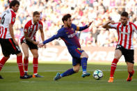 Soccer Football - La Liga Santander - FC Barcelona vs Athletic Bilbao - Camp Nou, Barcelona, Spain - March 18, 2018 Barcelona’s Lionel Messi in action with Athletic Bilbao's Unai Nunez and Mikel San Jose REUTERS/Albert Gea