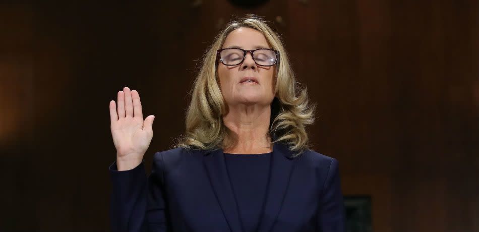 Christine Blasey Ford is sworn in before testifying before the Senate Judiciary Committee in the Dirksen Senate Office Building on Capitol Hill on September 27, 2018.