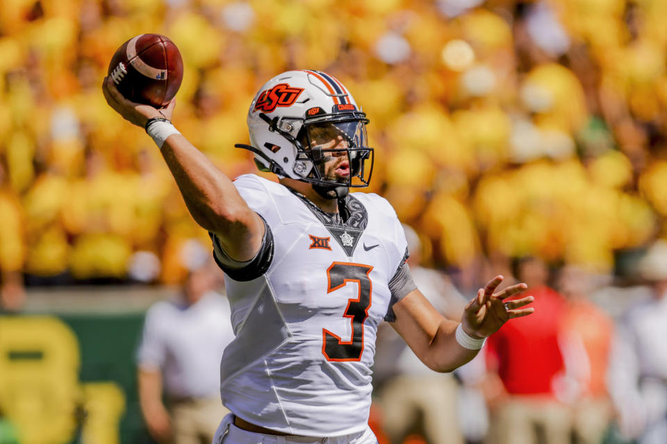 Oklahoma State quarterback Spencer Sanders (3) throws against Baylor in Waco, Texas, Saturday, Oct. 1, 2022. (AP Photo/Gareth Patterson)