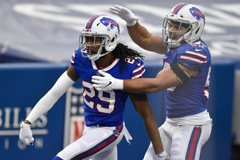 Buffalo Bills cornerback Josh Norman (29) celebrates his touchdown with outside linebacker Matt Milano (58) in the second half of an NFL football game against the Miami Dolphins, Sunday, Jan. 3, 2021, in Orchard Park, N.Y. (AP Photo/Adrian Kraus)