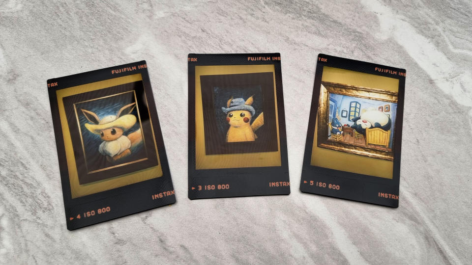 My collection of Instax prints captured at the Pokemon exhibit