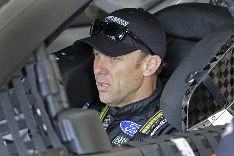 Matt Kenseth waits in his car before practice for Saturday’s NASCAR All-Star auto race at Charlotte Motor Speedway in Concord, N.C., Saturday, May 19, 2018. (AP Photo/Terry Renna)