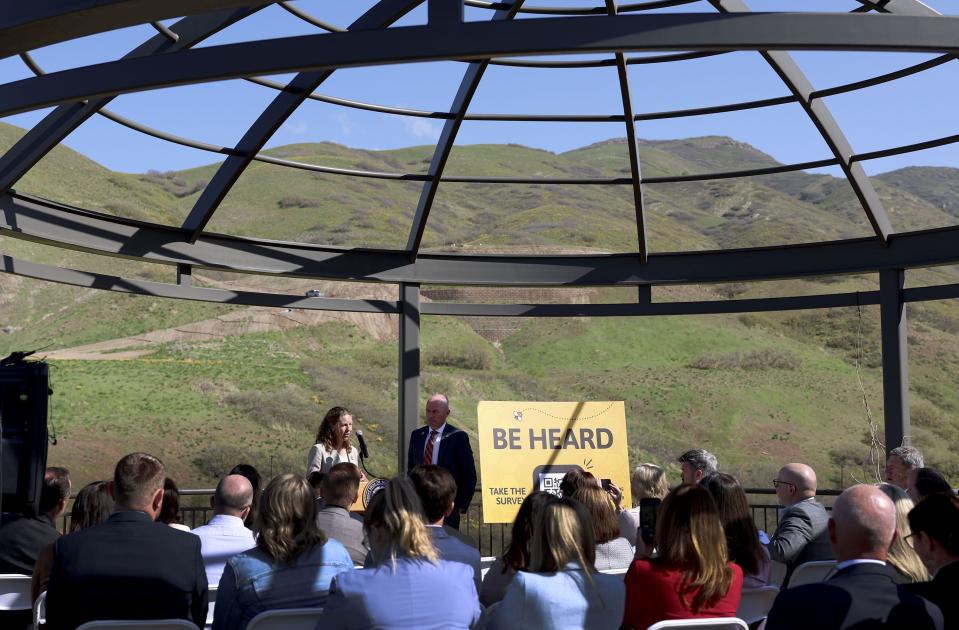 Laura Hanson, with the Governor’s Office of Planning and Budget, and Gov. Spencer Cox speak at the kickoff of the Guiding Our Growth statewide survey at Red Butte Garden in Salt Lake City on Thursday, May 11, 2023. The survey asks Utahns what they want for the future of the state when it comes to housing, water, transportation, open space and recreation. Utahns are invited to take the survey at https://guidingourgrowth.utah.gov/. | Laura Seitz, Deseret News
