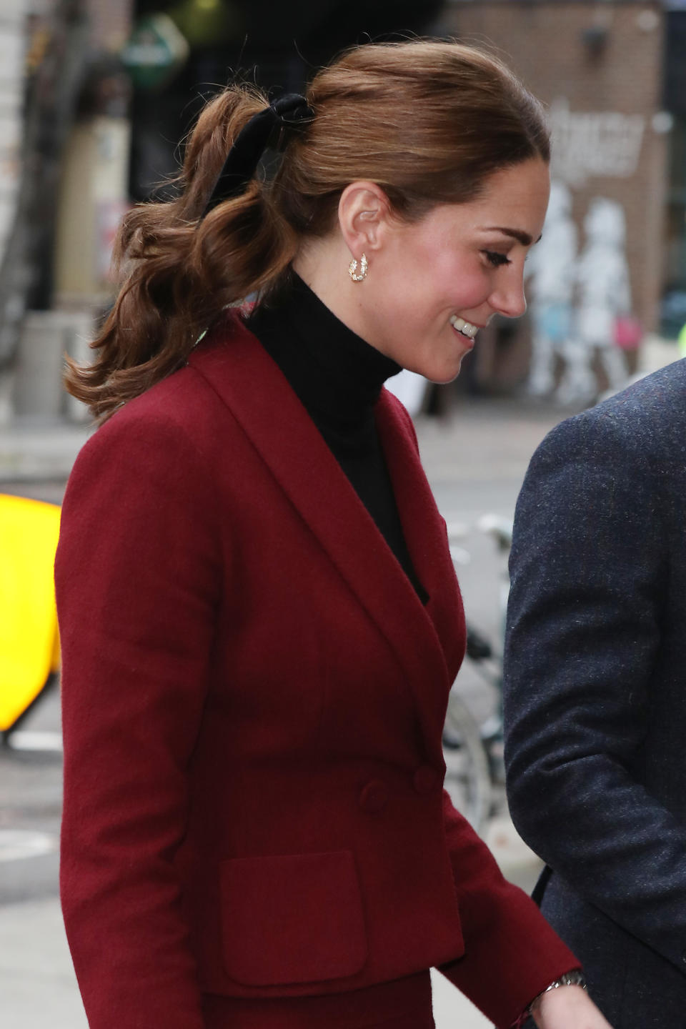 The Duchess of Cambridge also demonstrated how to wear this season’s biggest hair accessory [Photo: Getty]