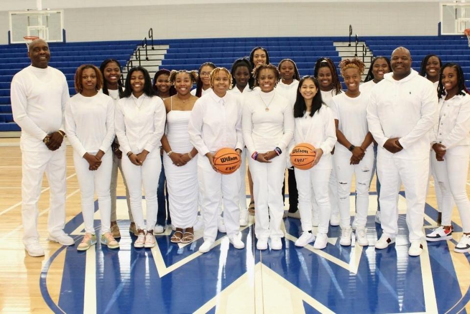 The Woodville-Tompkins girls basketball team on a "Whiteout" night the program held to celebrate coach Jeffery Roberson's 52nd birthday on Jan. 7, 2023.