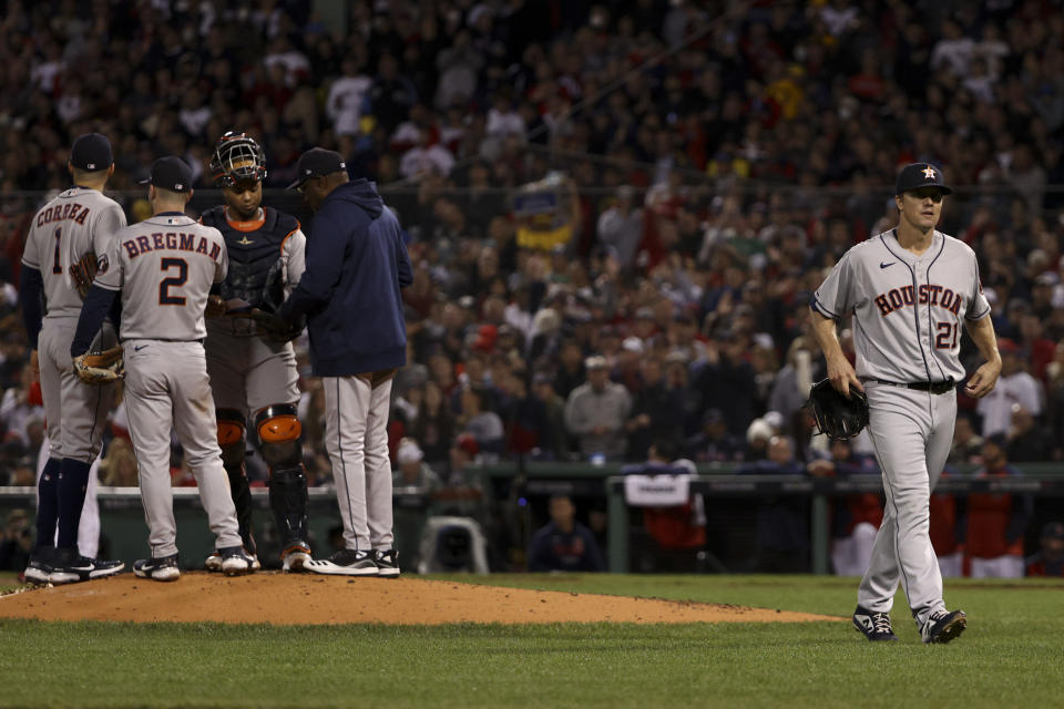 Houston Astros starting pitcher Zack Greinke is taken out of the game against the Boston Red Sox during the second inning in Game 4 of baseball's American League Championship Series Tuesday, Oct. 19, 2021, in Boston. (AP Photo/Winslow Townson)