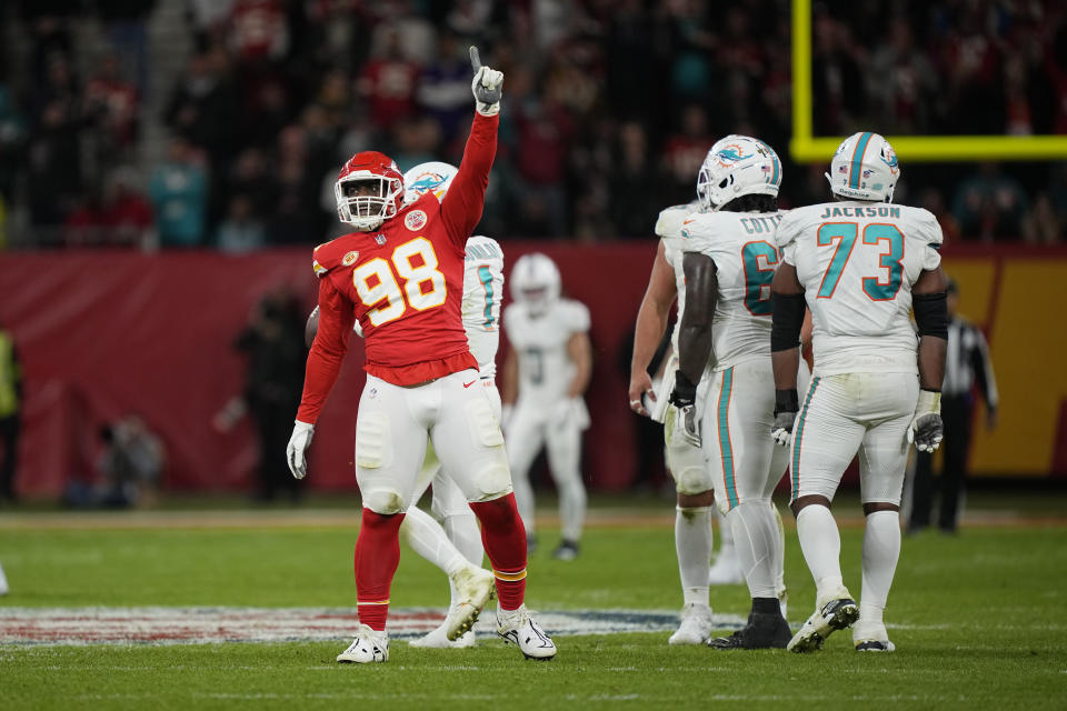 Kansas City Chiefs defensive tackle Tershawn Wharton (98) celebrates after sacking Miami Dolphins quarterback Tua Tagovailoa for an 11-yard loss during the second half of an NFL football game Sunday, Nov. 5, 2023, in Frankfurt, Germany. (AP Photo/Martin Meissner)