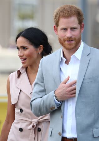 Britain's Meghan, the Duchess of Sussex, and Prince Harry, arrive at the Nelson Mandela Centenary Exhibition at the Southbank Centre's Queen Elizabeth Hall in central London, Britain, July 17, 2018. REUTERS/Hannah McKay