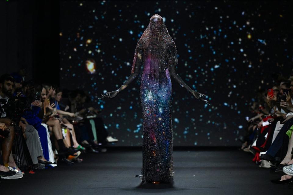 <p>A model presents a creation by Robert Wun during the Haute-Couture Fall/Winter 2024 show as part of the Paris Fashion Week</p> (AFP via Getty Images)