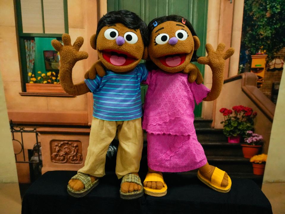 Twin Rohingya characters, Aziz and Noor, are pictured prior to the viewing of Sesame Street introducing the two new characters in the Rohingya language Saturday, Oct. 15, 2022, at the Burmese Rohingya Community of Wisconsin in Milwaukee.